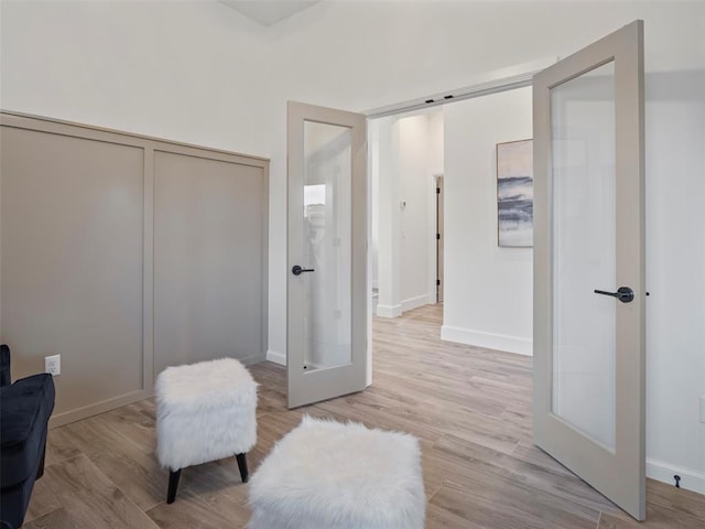 12712 NW 1st Ct, Yukon, OK 73099 - sitting room featuring light wood-style flooring and baseboards