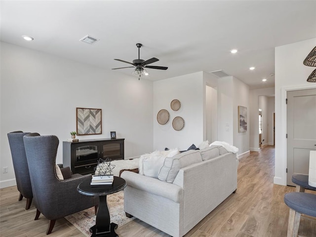 12712 NW 1st Ct, Yukon, OK 73099 - living room with a ceiling fan, light wood-type flooring, baseboards, and recessed lighting