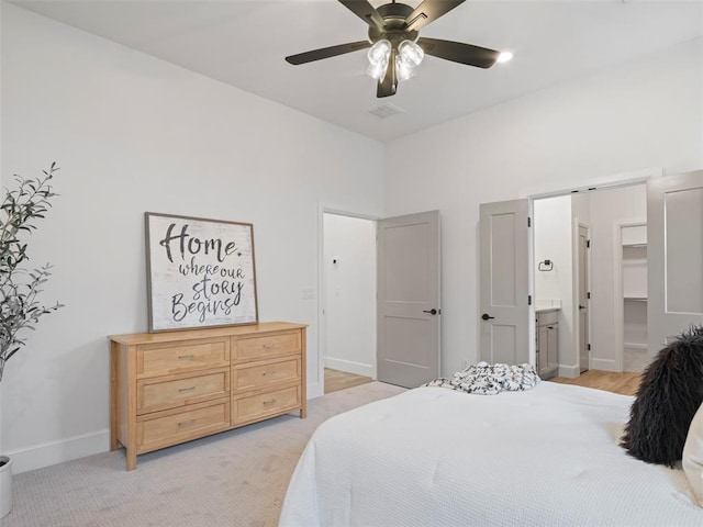 12712 NW 1st Ct, Yukon, OK 73099 - bedroom featuring baseboards, ceiling fan, and light colored carpet