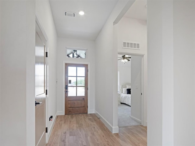 12712 NW 1st Ct, Yukon, OK 73099 - entrance foyer featuring light wood-type flooring, baseboards, and a ceiling fan