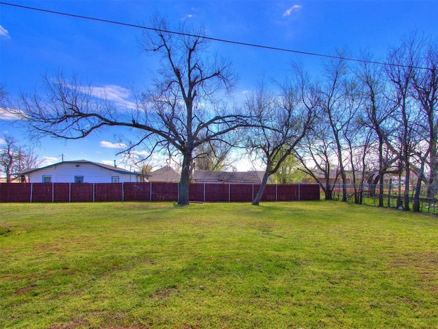 view of yard with fence