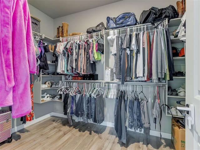 8129 NW 153rd St, Edmond, OK 73013 - walk in closet with wood finished floors