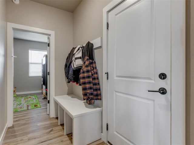 8129 NW 153rd St, Edmond, OK 73013 - mudroom with light wood-style flooring and baseboards