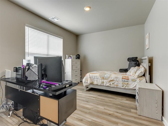 8129 NW 153rd St, Edmond, OK 73013 - bedroom featuring light wood finished floors and an office area