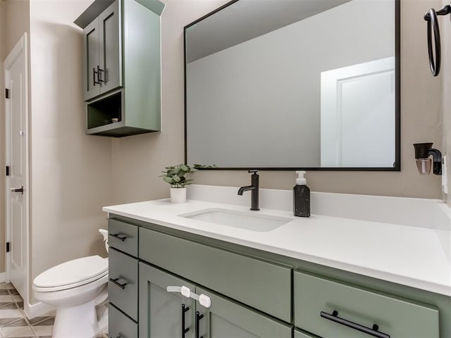 8129 NW 153rd St, Edmond, OK 73013 - bathroom with vanity, toilet, tile patterned flooring, and baseboards
