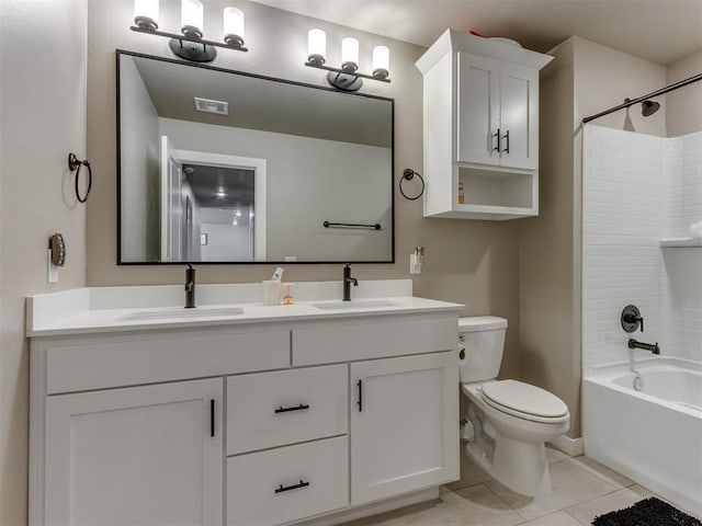 8129 NW 153rd St, Edmond, OK 73013 - full bathroom featuring double vanity, toilet, tub / shower combination, and tile patterned floors