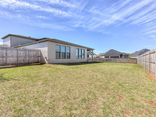 8129 NW 153rd St, Edmond, OK 73013 - rear view of property with brick siding