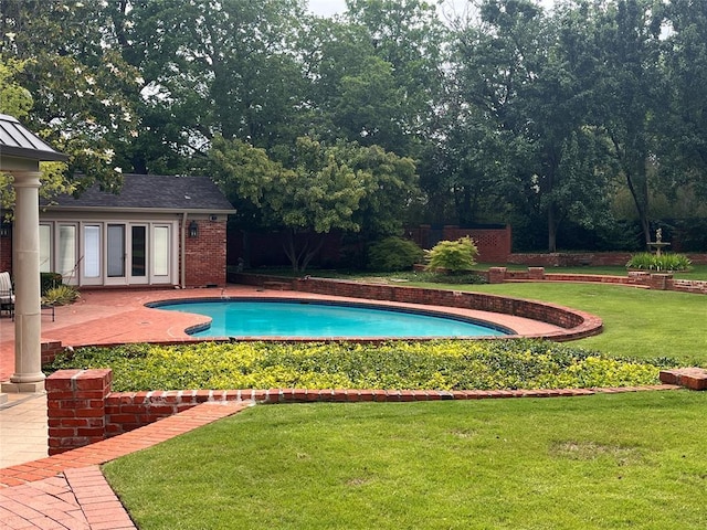 6802 NW Grand Blvd, Nichols Hills, OK 73116 - swimming pool with a yard and a patio area