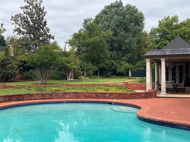 6802 NW Grand Blvd, Nichols Hills, OK 73116 - swimming pool with a patio area