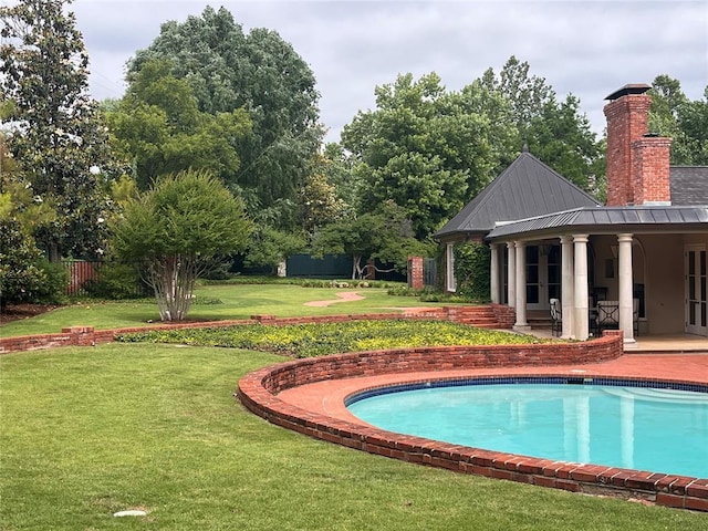 6802 NW Grand Blvd, Nichols Hills, OK 73116 - swimming pool with a patio