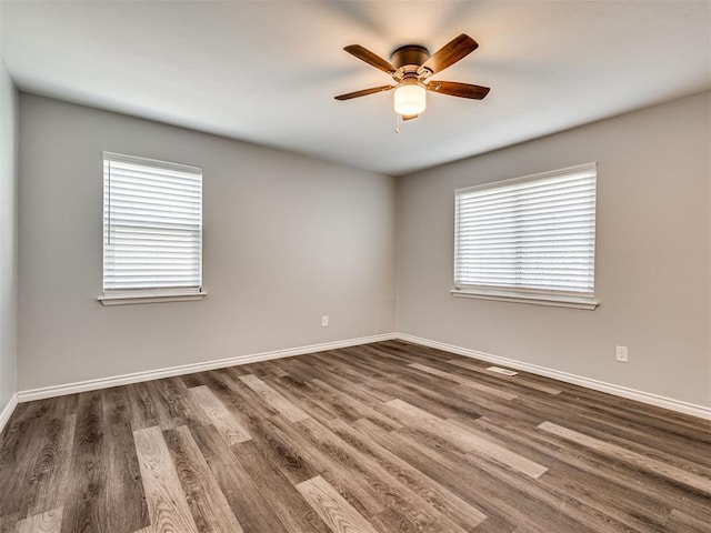 5917 N Roff Ave, Oklahoma City, OK 73112 - empty room with baseboards, wood finished floors, and a ceiling fan