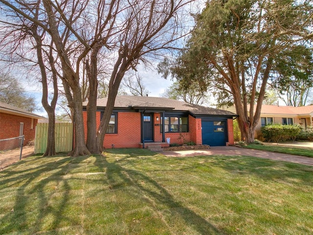 1002 Garver St, Norman, OK 73069 - single story home with an attached garage, brick siding, and concrete driveway