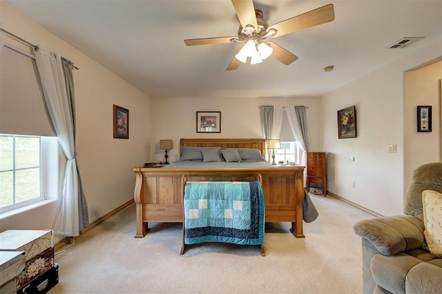 9122 Ns 3540th Rd, Prague, OK 74864 - bedroom featuring baseboards, visible vents, a ceiling fan, and light carpet