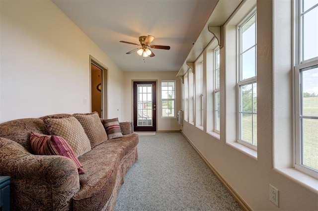 9122 Ns 3540th Rd, Prague, OK 74864 - sunroom featuring baseboards and carpet floors