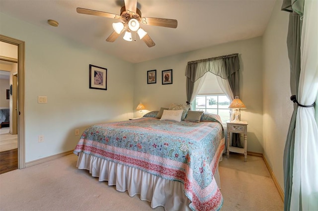 9122 Ns 3540th Rd, Prague, OK 74864 - bedroom featuring baseboards, light colored carpet, and ceiling fan