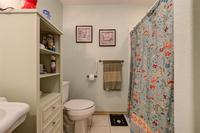 9122 Ns 3540th Rd, Prague, OK 74864 - full bath with tile patterned floors, curtained shower, and toilet