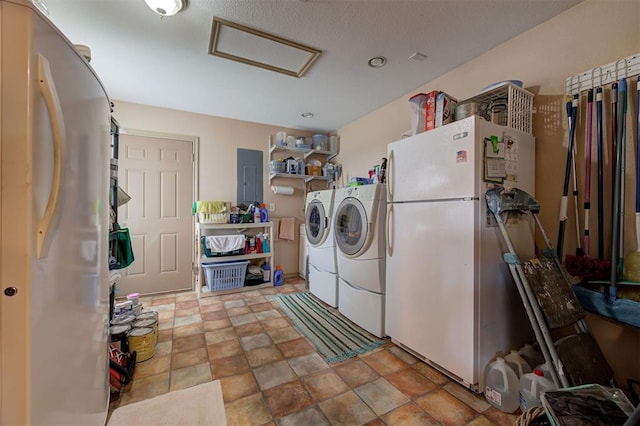 9122 Ns 3540th Rd, Prague, OK 74864 - laundry area with attic access and washer and dryer