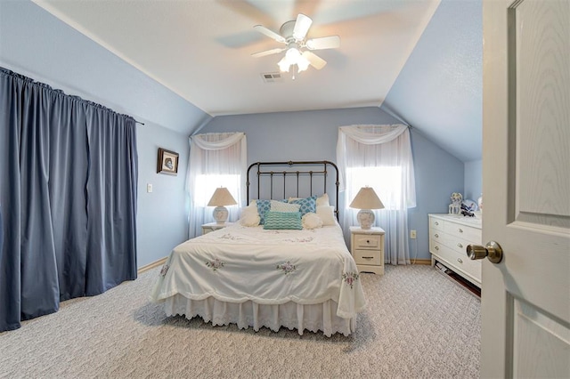 9122 Ns 3540th Rd, Prague, OK 74864 - bedroom with multiple windows, visible vents, lofted ceiling, and carpet