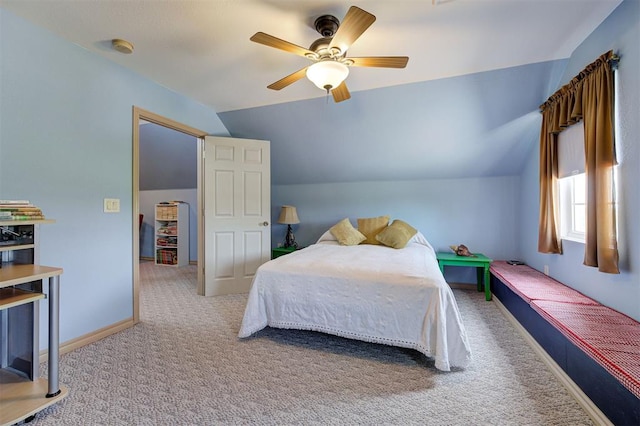 9122 Ns 3540th Rd, Prague, OK 74864 - carpeted bedroom with baseboards, vaulted ceiling, and a ceiling fan