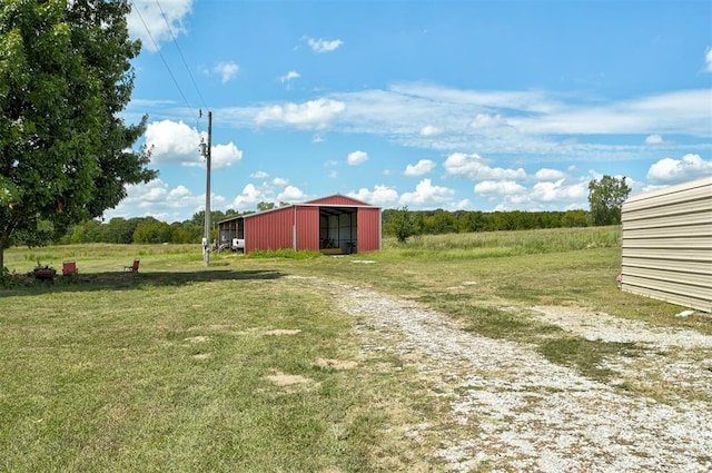 9122 Ns 3540th Rd, Prague, OK 74864 - view of yard with driveway and an outbuilding