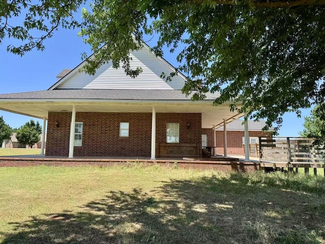 817 SW 16th St, Newcastle, OK 73065 - rear view of property featuring brick siding and a yard
