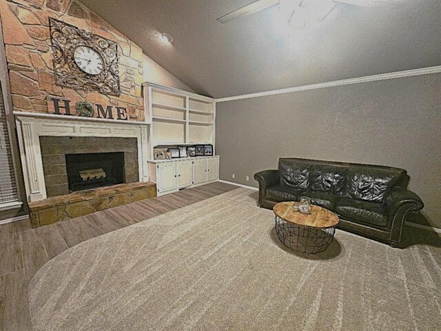 1402 Broad Acres Dr, Norman, OK 73072 - living area featuring wood finished floors, lofted ceiling, a fireplace, a ceiling fan, and ornamental molding