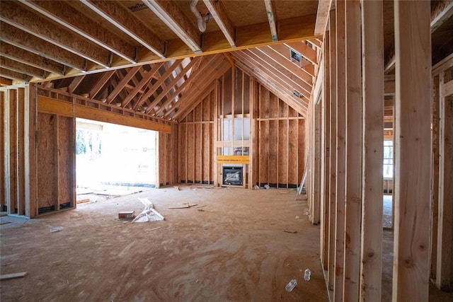 14016 Willow Ln, Edmond, OK 73049 - miscellaneous room with lofted ceiling