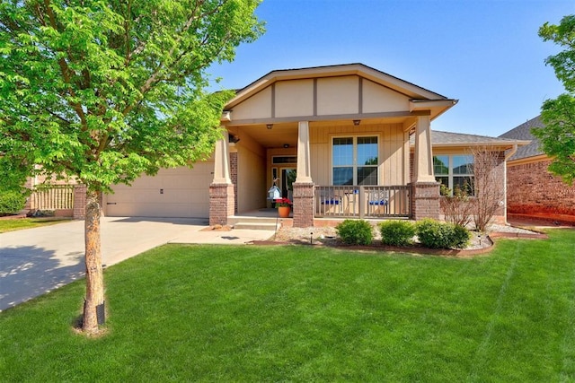 708 Havasu Dr, Norman, OK 73071 - craftsman-style house featuring covered porch, driveway, a front lawn, an attached garage, and brick siding
