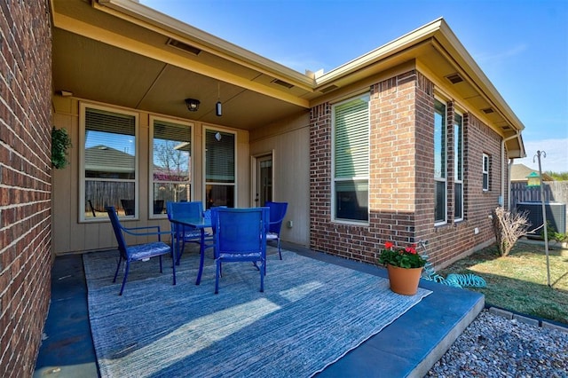 708 Havasu Dr, Norman, OK 73071 - wooden terrace featuring central AC, fence, and outdoor dining space