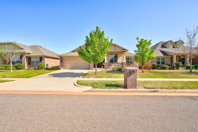 708 Havasu Dr, Norman, OK 73071 - view of front facade with concrete driveway, a garage, a front yard, and brick siding