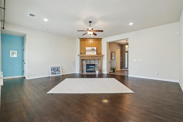 708 Havasu Dr, Norman, OK 73071 - living area with a ceiling fan, a high end fireplace, dark wood finished floors, recessed lighting, and baseboards