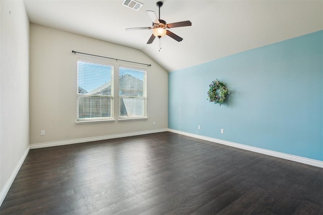 708 Havasu Dr, Norman, OK 73071 - unfurnished room with vaulted ceiling, ceiling fan, dark wood finished floors, and baseboards