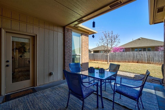 708 Havasu Dr, Norman, OK 73071 - view of patio / terrace with a fenced backyard and outdoor dining area