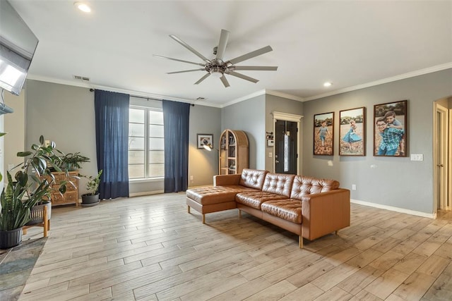 3311 Terrace Hills Rd, Piedmont, OK 73078 - living room with ornamental molding, baseboards, light wood-style floors, visible vents, and ceiling fan