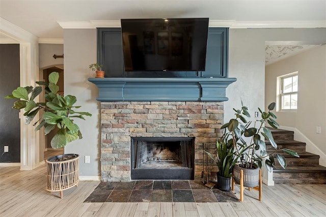 3311 Terrace Hills Rd, Piedmont, OK 73078 - interior details featuring a fireplace with flush hearth, crown molding, baseboards, and wood finished floors