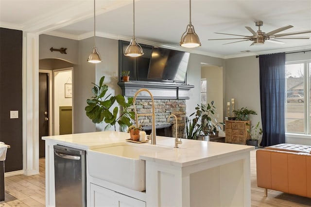 3311 Terrace Hills Rd, Piedmont, OK 73078 - kitchen with a fireplace, light wood-style floors, ceiling fan, and ornamental molding