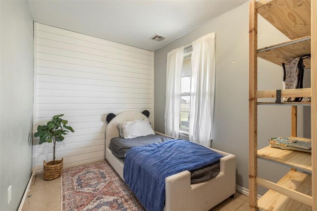 3311 Terrace Hills Rd, Piedmont, OK 73078 - bedroom featuring visible vents and wood walls