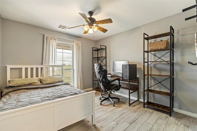 3311 Terrace Hills Rd, Piedmont, OK 73078 - bedroom featuring light wood-type flooring, baseboards, ceiling fan, and visible vents