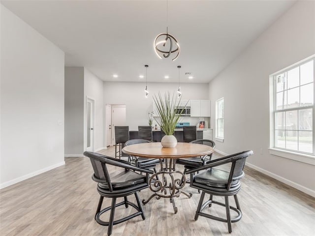 3100 NE 17th St, Oklahoma City, OK 73121 - dining room with light wood-type flooring, baseboards, recessed lighting, and a chandelier
