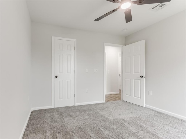 3100 NE 17th St, Oklahoma City, OK 73121 - unfurnished bedroom with carpet floors, baseboards, and a ceiling fan
