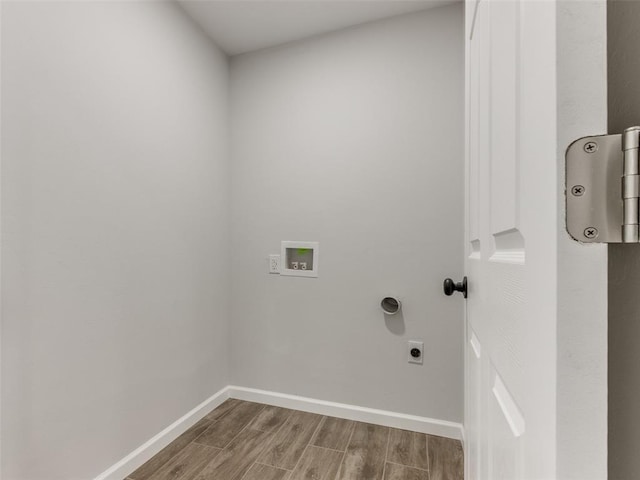 3100 NE 17th St, Oklahoma City, OK 73121 - washroom featuring electric dryer hookup, wood finish floors, washer hookup, and baseboards