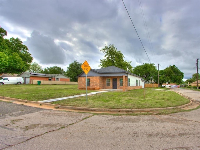 3100 NE 17th St, Oklahoma City, OK 73121 - view of front of property with driveway and brick siding