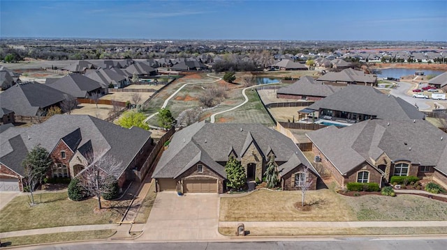 8301 NW 146th St, Oklahoma City, OK 73142 - bird's eye view featuring a water view and a residential view