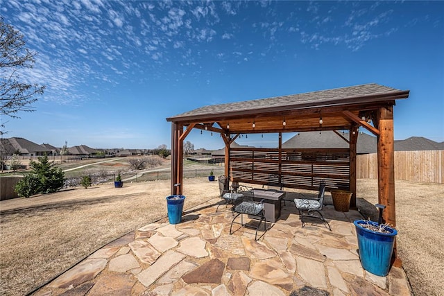 8301 NW 146th St, Oklahoma City, OK 73142 - view of patio / terrace with fence and a gazebo