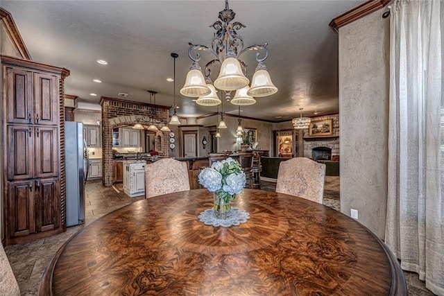 8301 NW 146th St, Oklahoma City, OK 73142 - dining room featuring ornamental molding, recessed lighting, and a notable chandelier