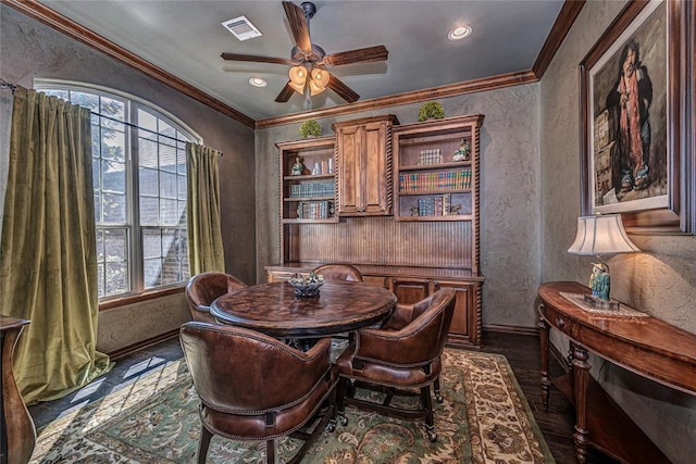 8301 NW 146th St, Oklahoma City, OK 73142 - dining area with baseboards, visible vents, crown molding, and ceiling fan