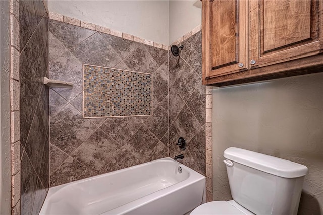 8301 NW 146th St, Oklahoma City, OK 73142 - full bathroom with tub / shower combination, toilet, and a textured wall
