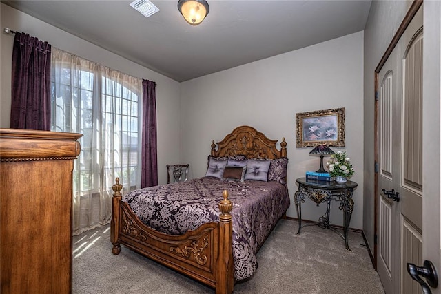 8301 NW 146th St, Oklahoma City, OK 73142 - carpeted bedroom featuring visible vents