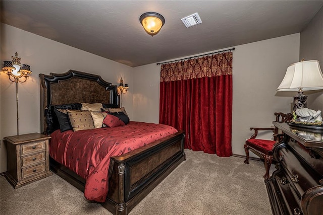 8301 NW 146th St, Oklahoma City, OK 73142 - carpeted bedroom with visible vents and a textured ceiling