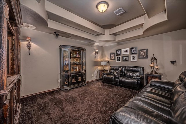 8301 NW 146th St, Oklahoma City, OK 73142 - living area featuring a tray ceiling, baseboards, visible vents, and carpet